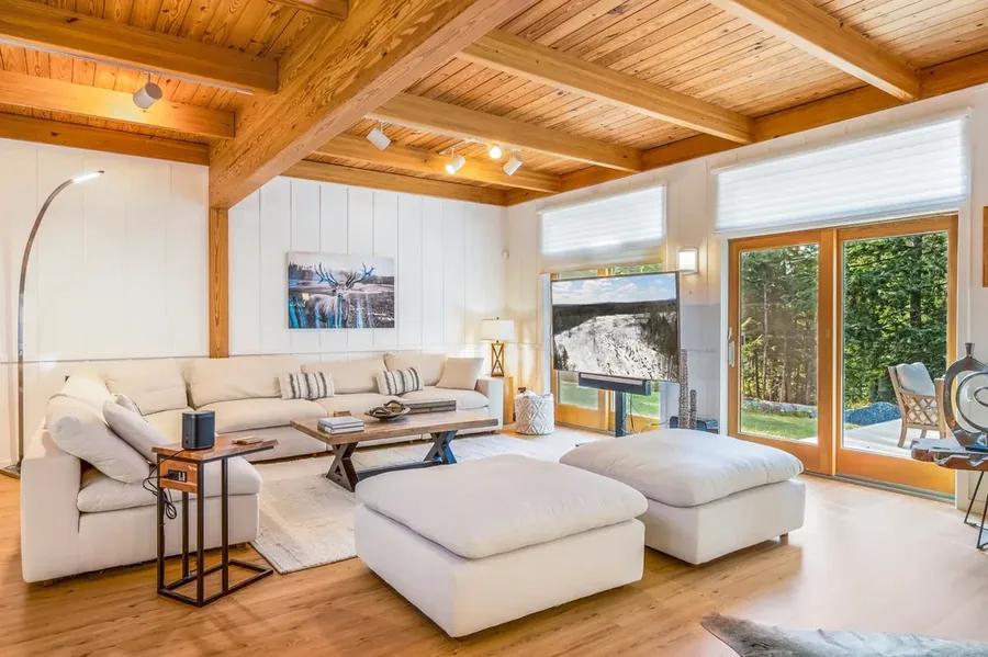 Sunlit living room with sectional sofa